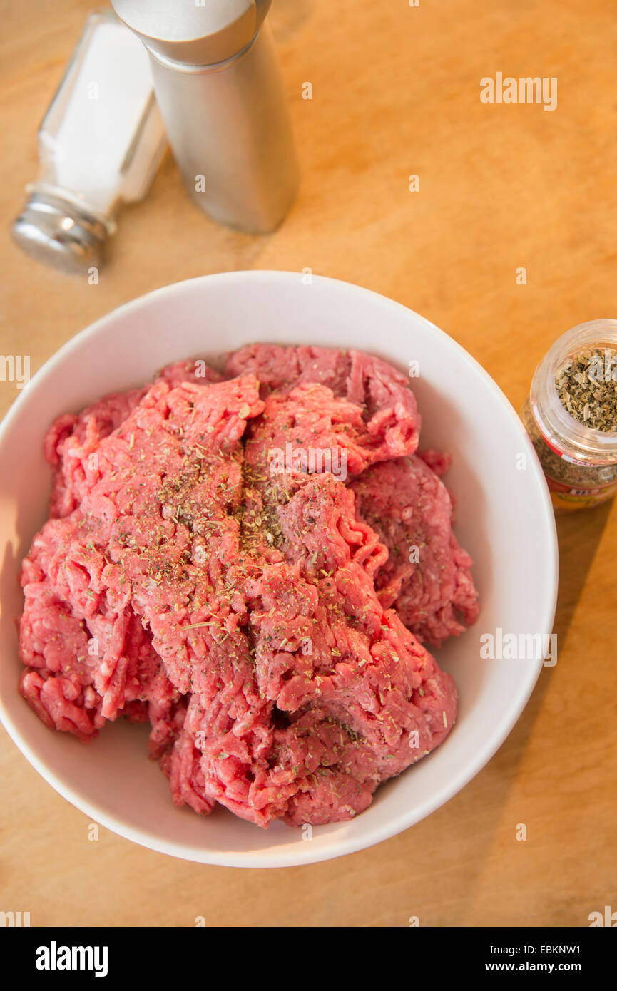 Close-up shot of peppered ground beef in white bowl Stock Photo