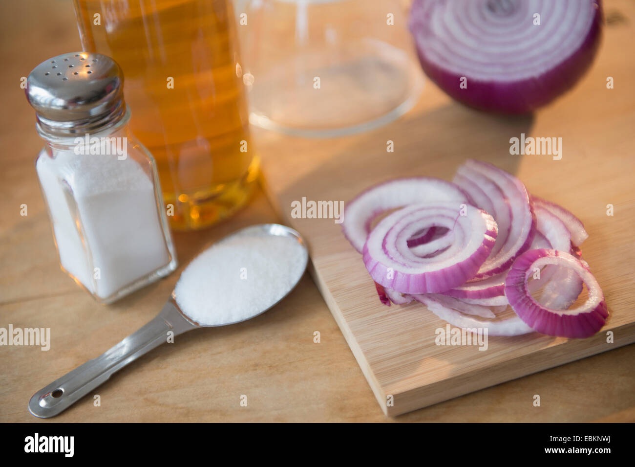 Studio shot of red onion and salt Stock Photo