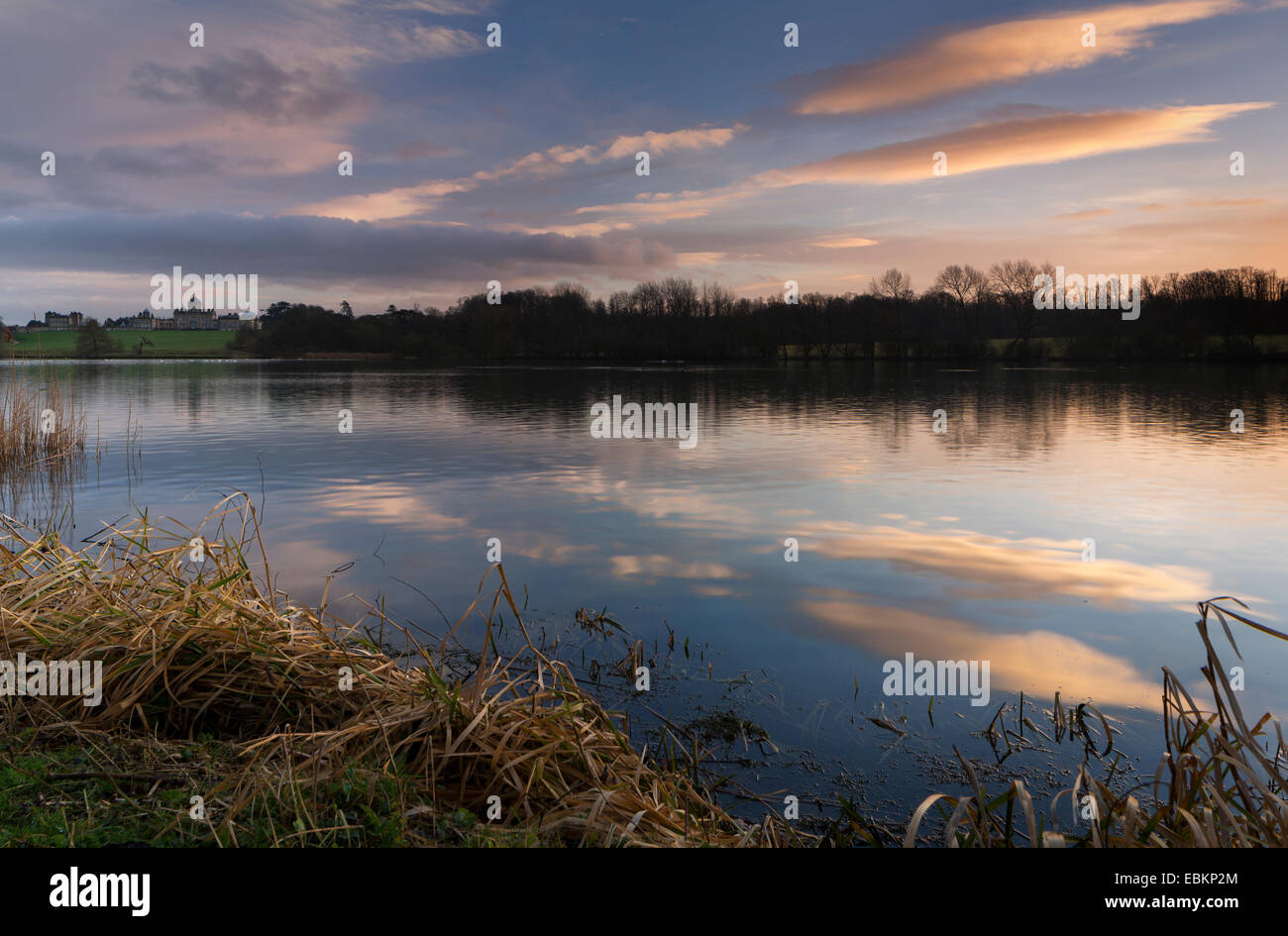 Sunset over The Great Lake at Castle Howard in mid-winter. Stock Photo