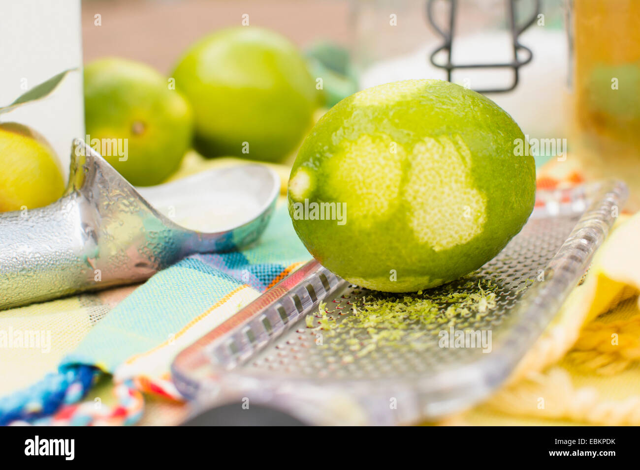 Studio shot of lime and grater Stock Photo