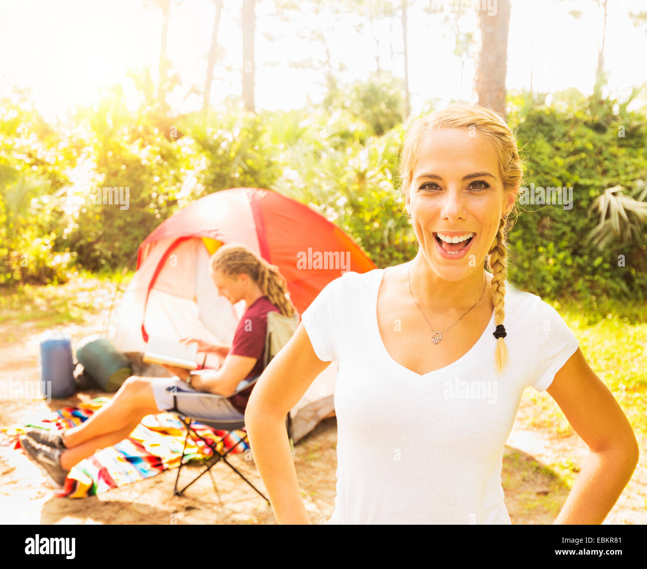 USA, Florida, Tequesta, Portrait of smiling woman and man reading book Stock Photo