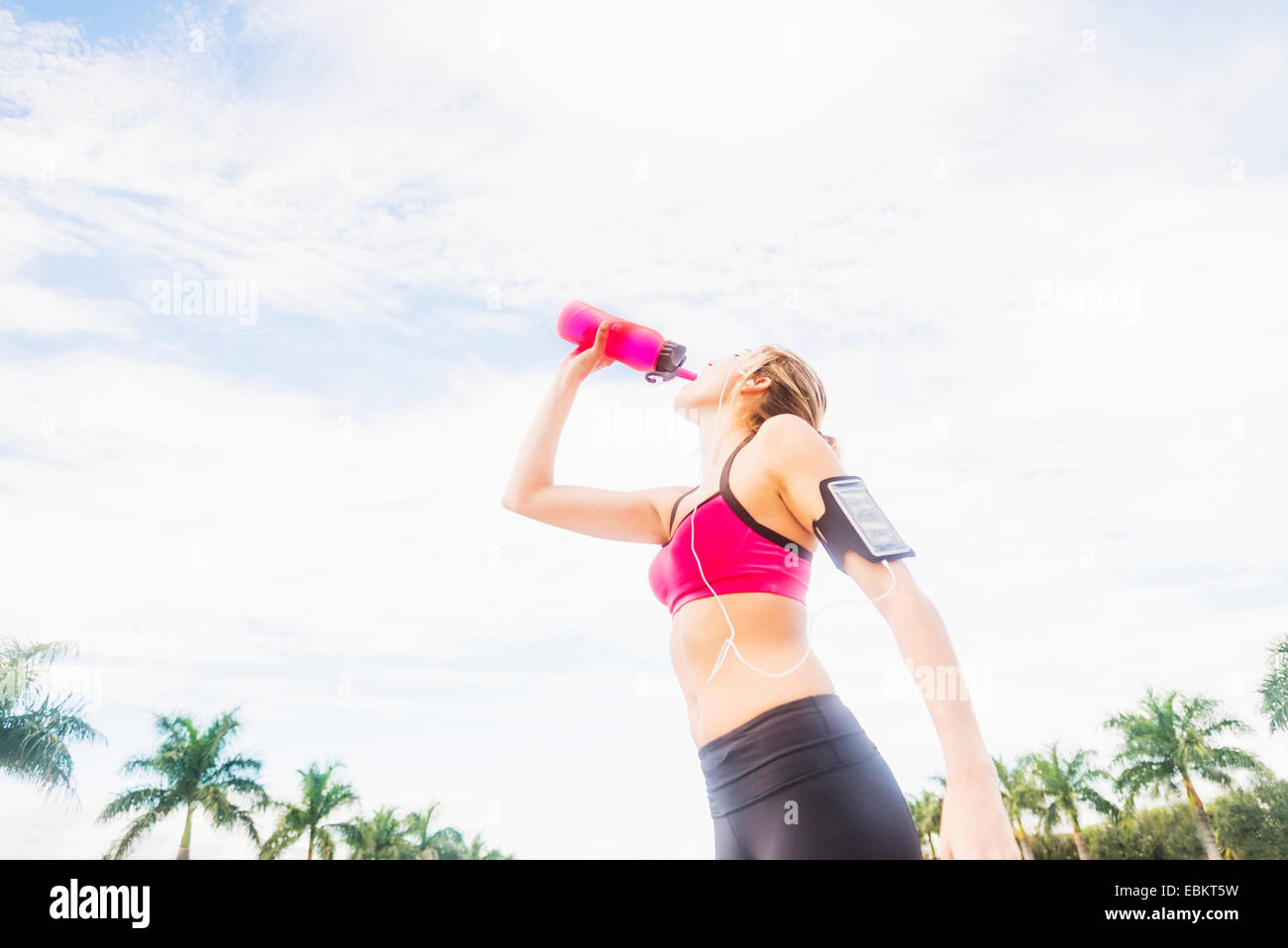 USA, Florida, Jupiter, Woman drinking water from bottle Stock Photo