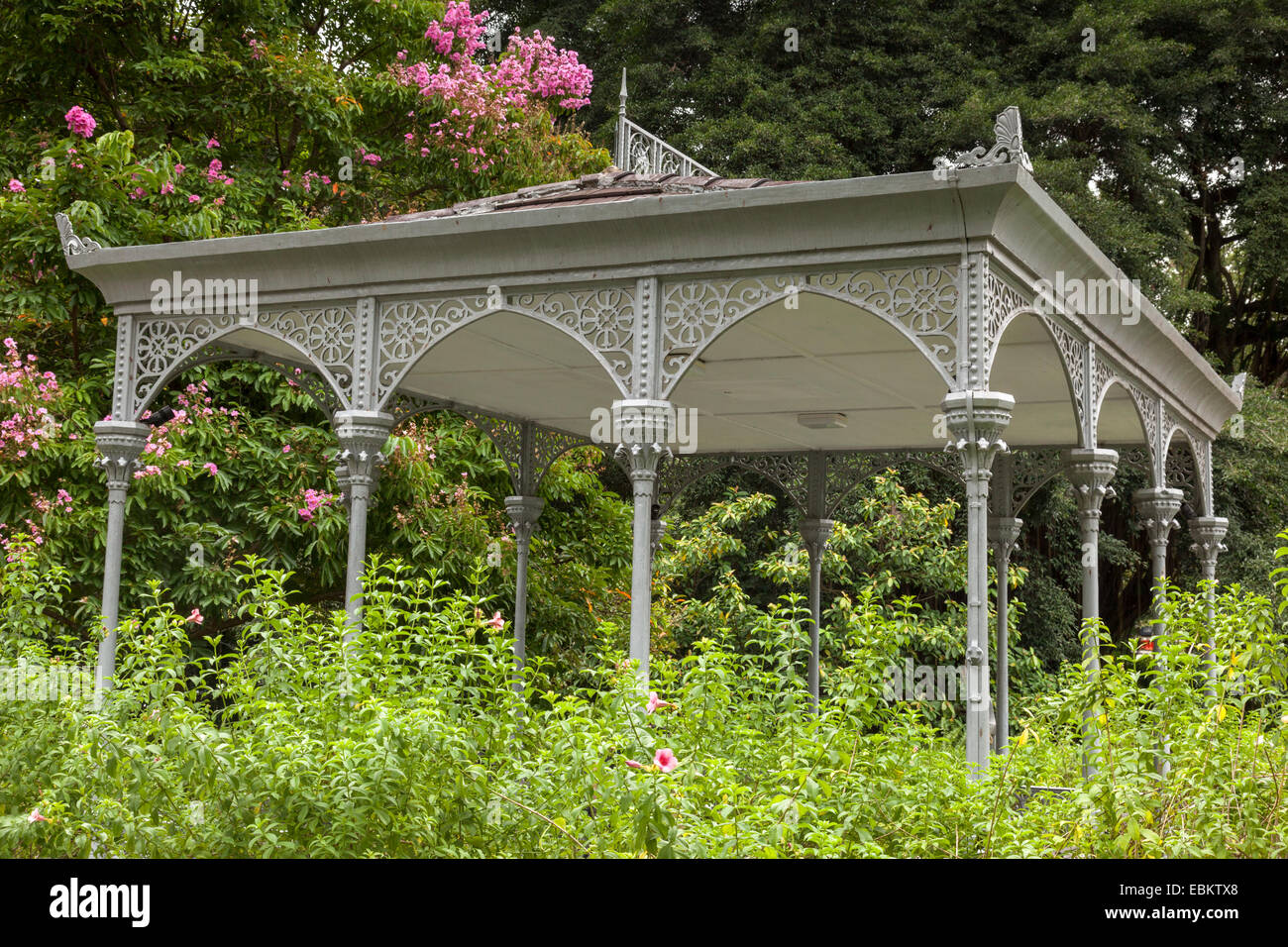 Swan Lake Gazebo, a Victorian cast iron garden shelter in Singapore Botanic Gardens. Stock Photo