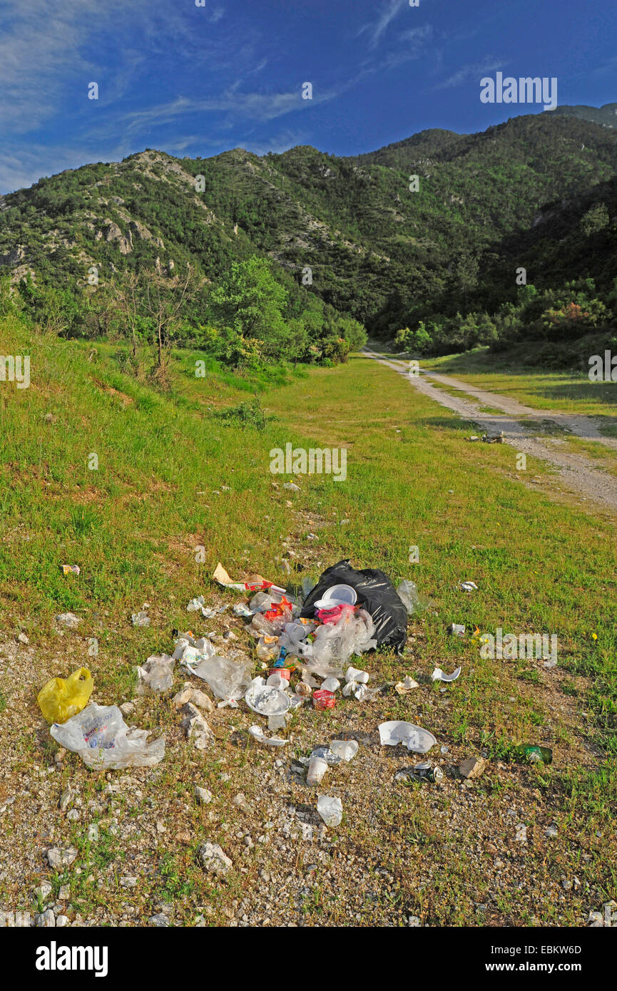 rubbish at the side of a road through a green hill landscape, Greece, Macedonia, Olymp Stock Photo