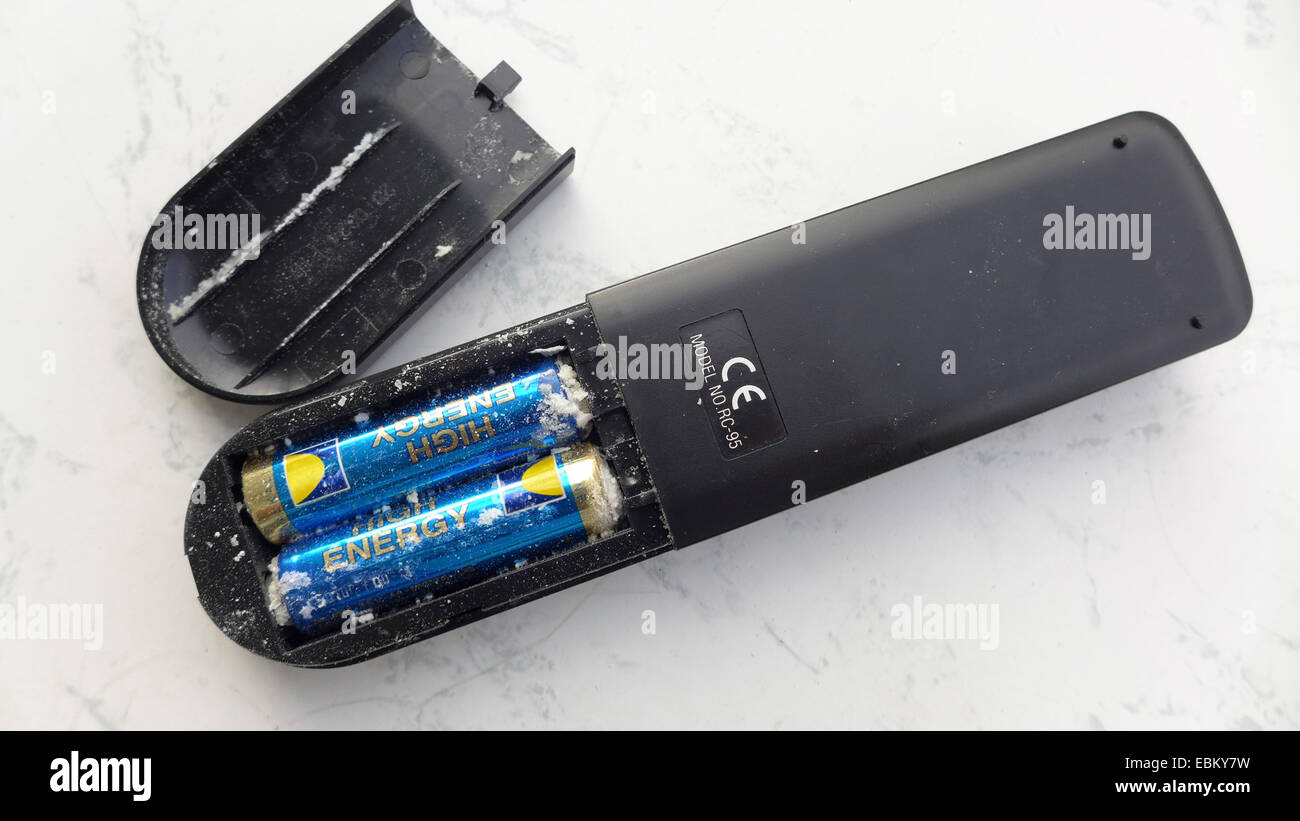 leaked batteries in a remote control Stock Photo