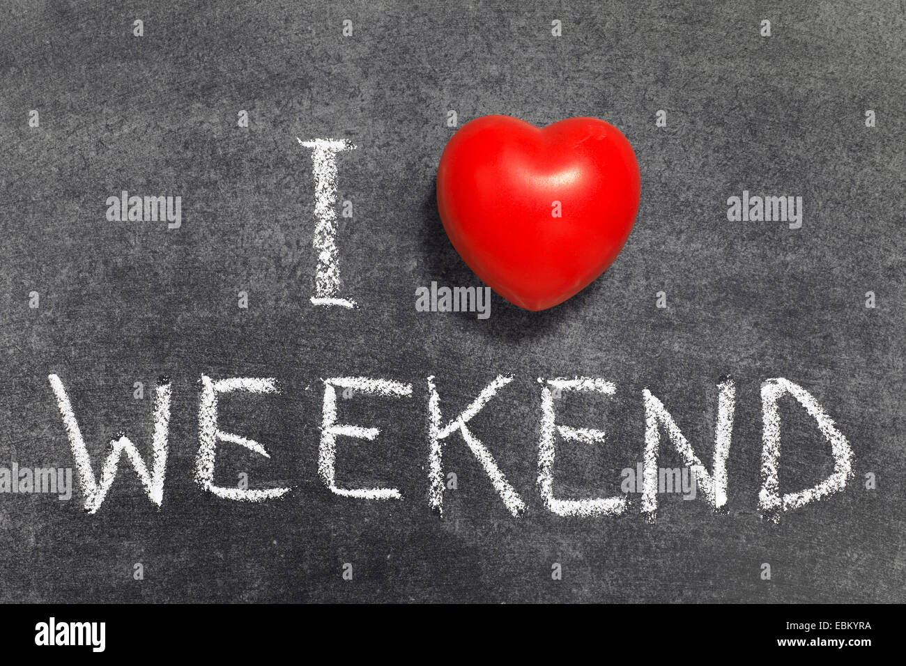I love weekend phrase handwritten on blackboard with red heart symbol Stock Photo