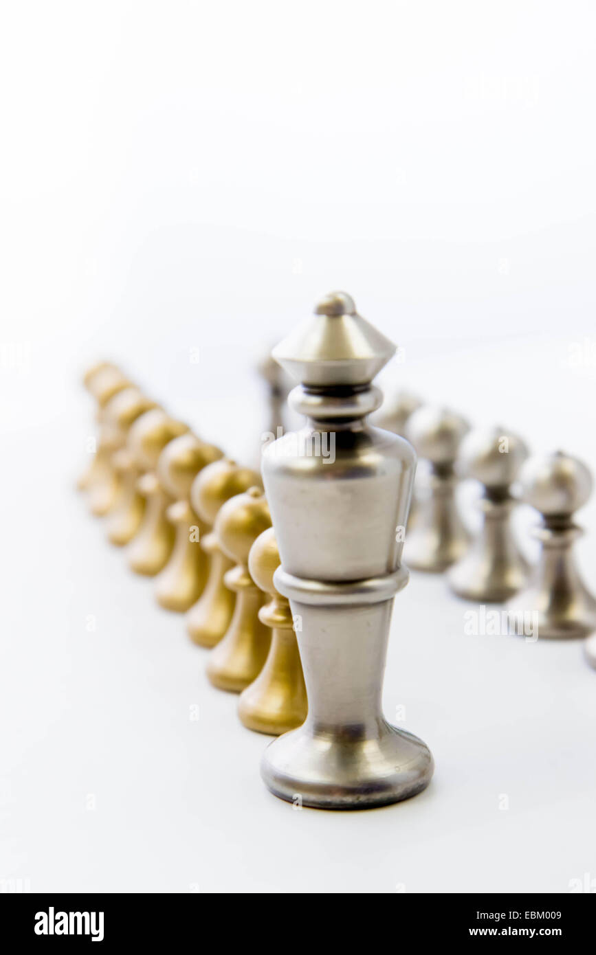 Classic chess game - King with a line of pawns Stock Photo