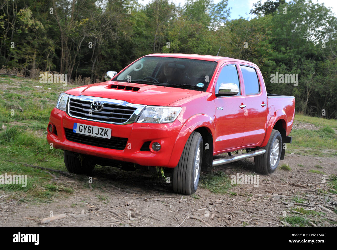 2012 Toyota Hilux Invincible 4 wheel drive pick up truck driving off road Stock Photo