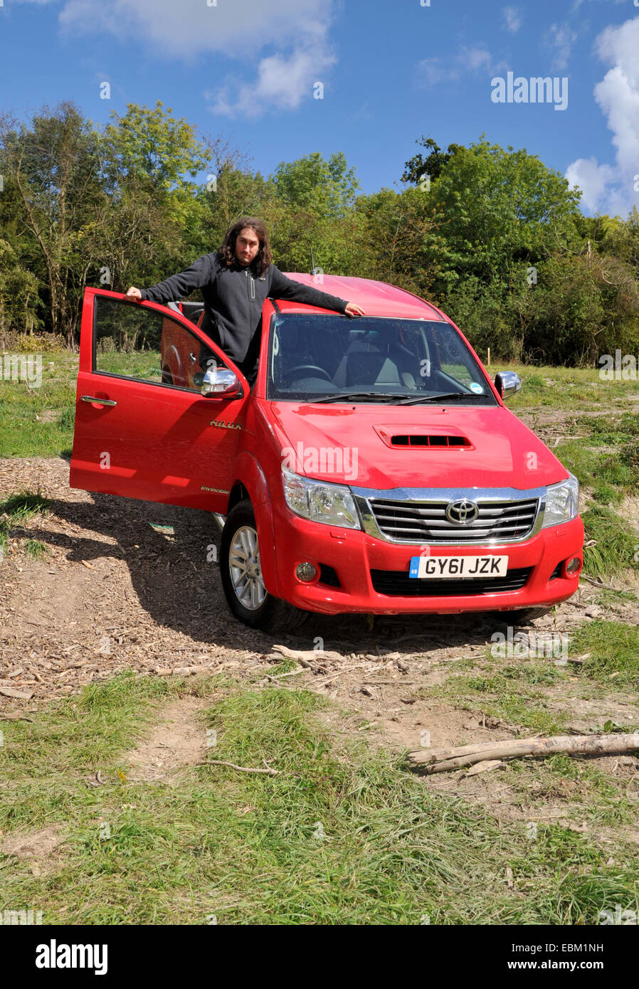 Comedian Ross Noble with a 2012 Toyota Hilux pick up truck driving off road Stock Photo