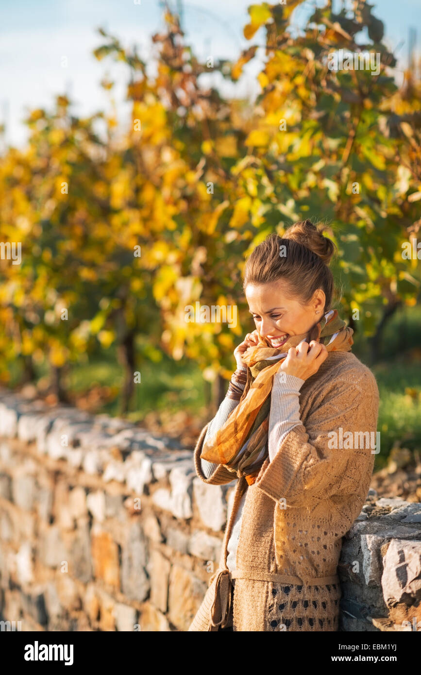 Happy young woman in autumn park Stock Photo