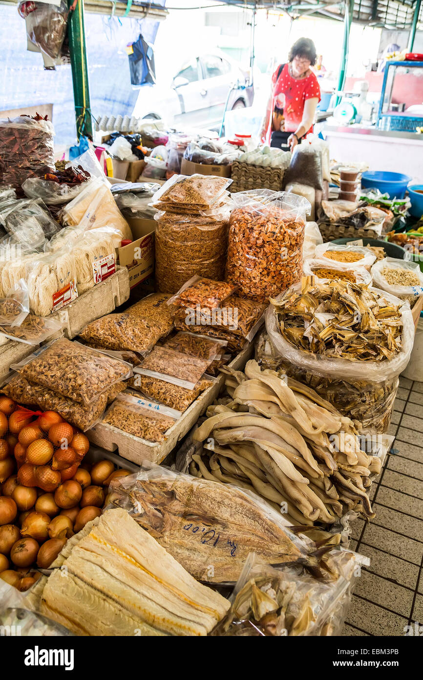 Shopping for dried fish in covered market, Miri, Malaysia Stock Photo