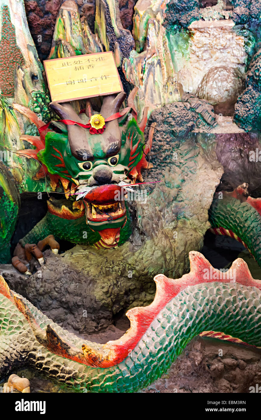 Dragon man carving in Tua Pek Kong Chinese Temple, Miri, Sarawak, Malaysia Stock Photo