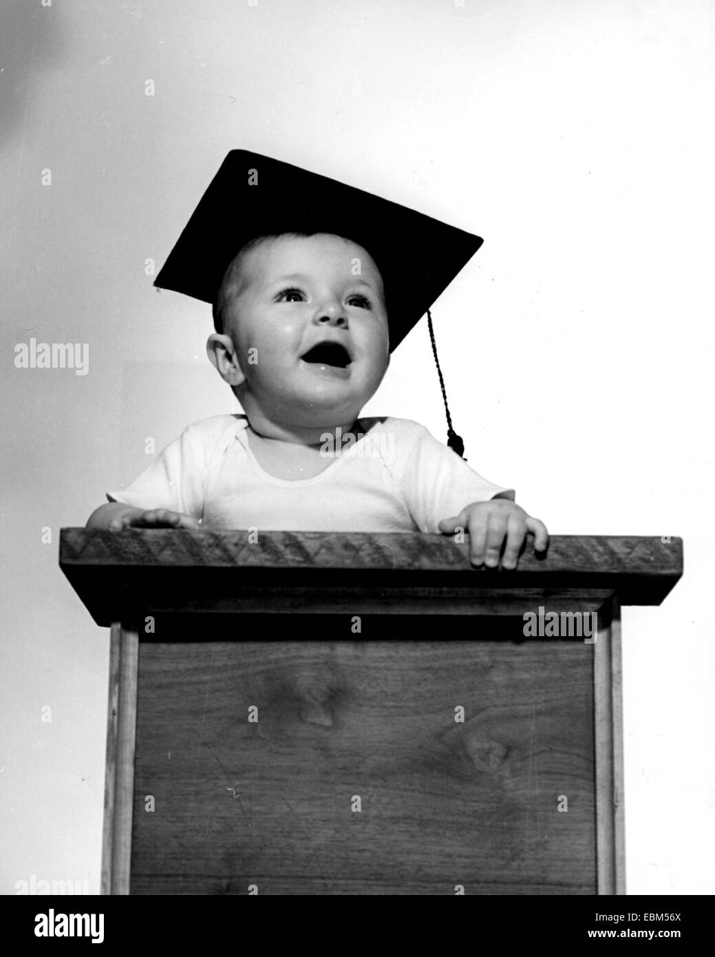 BOY WITH MORTAR BOARD Stock Photo