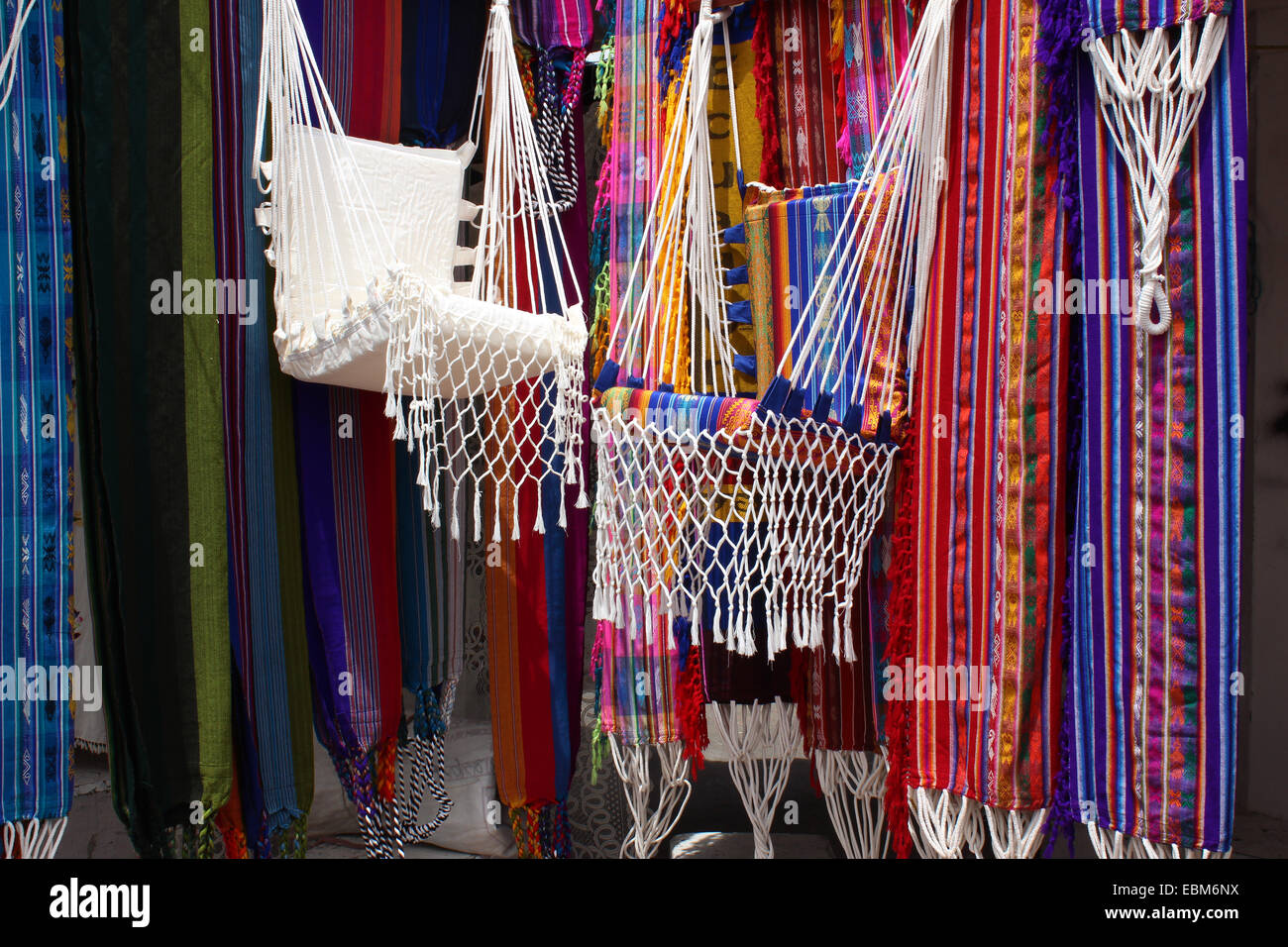 Colorful handmade hammocks for sale at the outdoor craft market in
