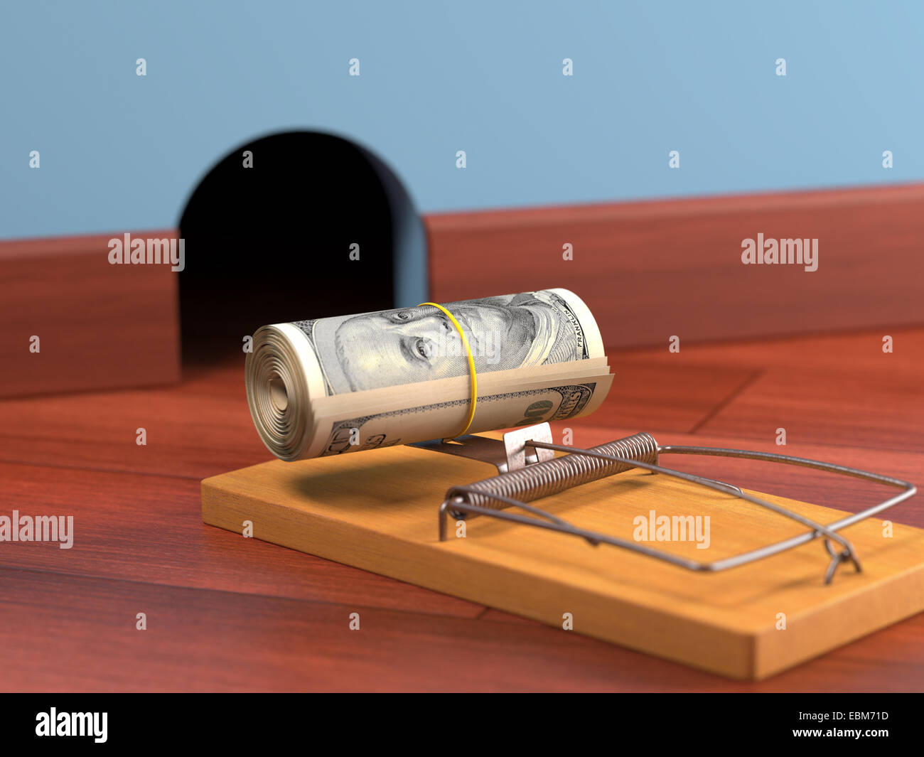 Wad of cash as bait in a trap. Depth of field. Stock Photo