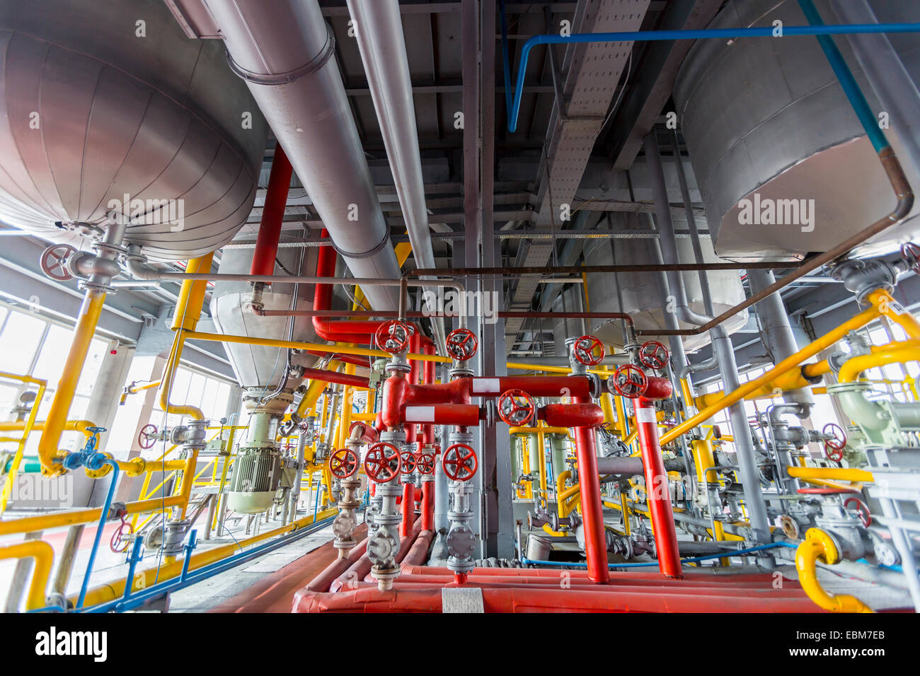 Pipelines of an oil refinery from the inside Stock Photo Alamy