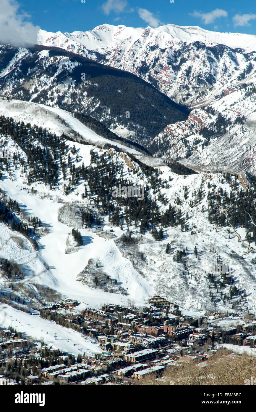 Snow-covered Aspen Mountain, surrounding mountains and Aspen, Colorado USA Stock Photo