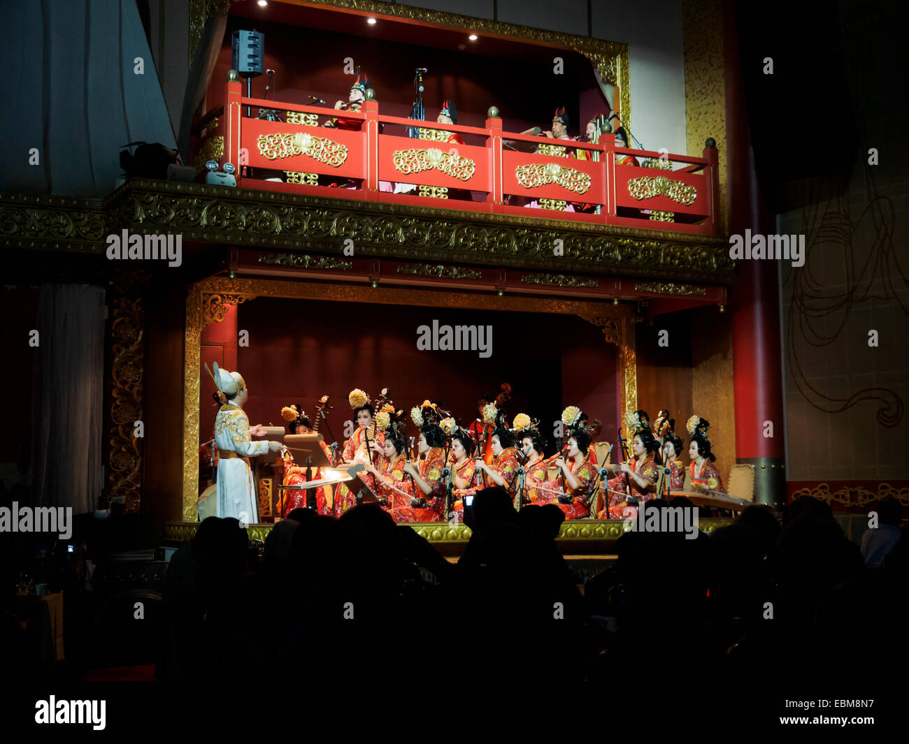 Female musicians playing traditional musical instrument Erhu during Chinese opera Stock Photo