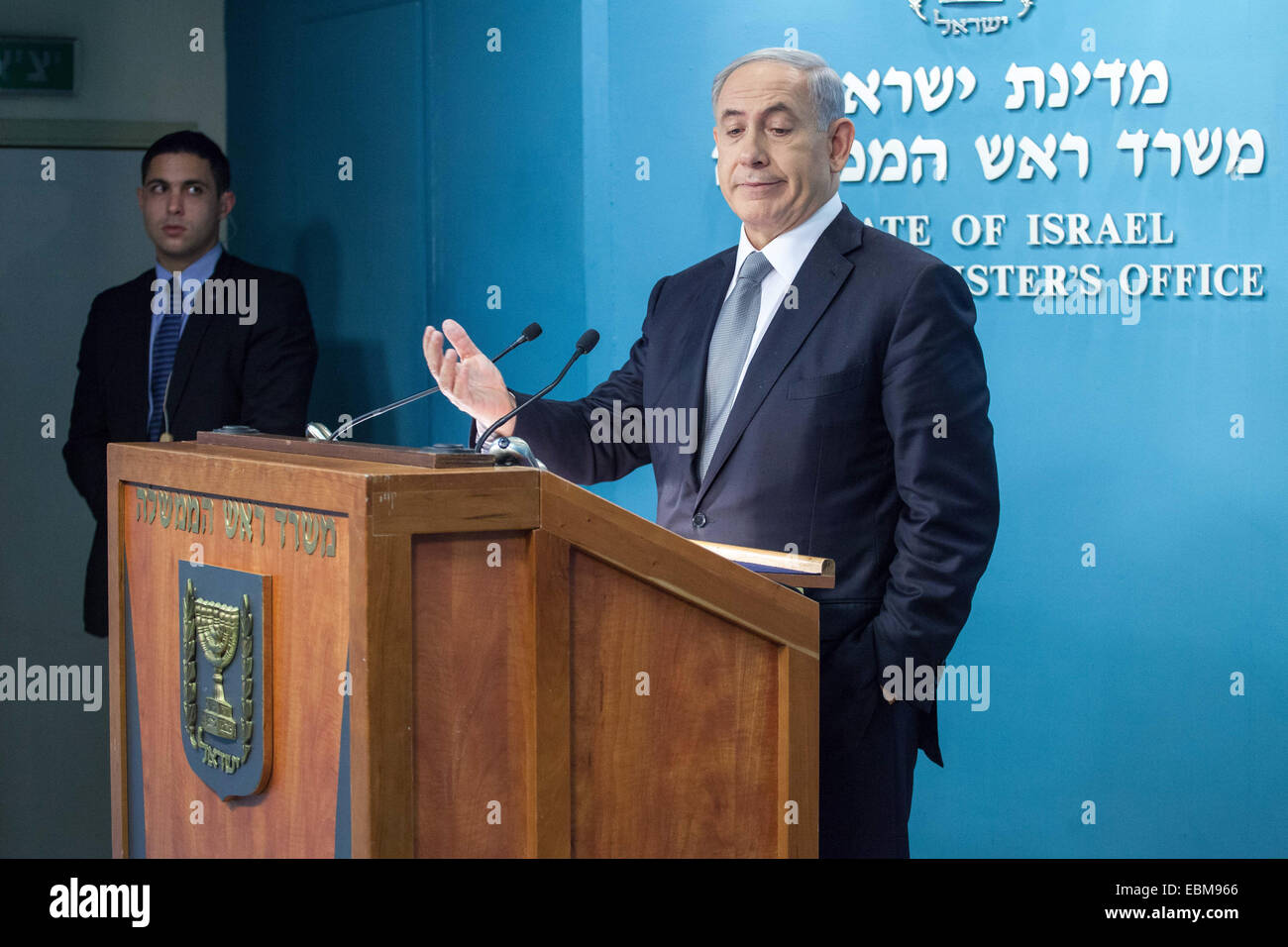 Jerusalem. 2nd Dec, 2014. Israeli Prime Minister Benjamin Netanyahu addresses a press conference at the Prime Minister's office in Jerusalem, on Dec. 2, 2014. Israeli Prime Minister Benjamin Netanyahu announced his support for dispersing the Knesset (parliament) and conducting early elections amid a coalition crisis. During a press conference at his Jerusalem office, Netanyahu also said he has ordered to fire Justice Minister Tzipi Livni and Finance Minister Yair Lapid, who he said plotted against him by outspokenly criticizing his policies. Credit:  JINI/Emil Salman/Xinhua/Alamy Live News Stock Photo
