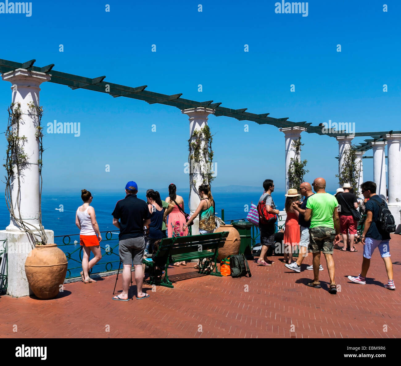 Tourists admiring the view over Capri. Stock Photo