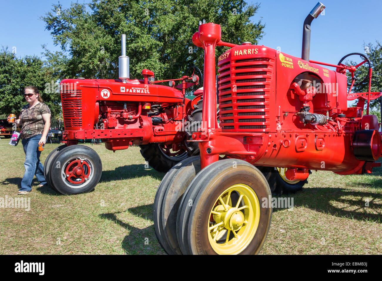 Lake Wales Florida,Lake Wailes,public park,Pioneer Days,festival,annual event,celebration,red,antique,tractors,product products display sale,Massey-Ha Stock Photo