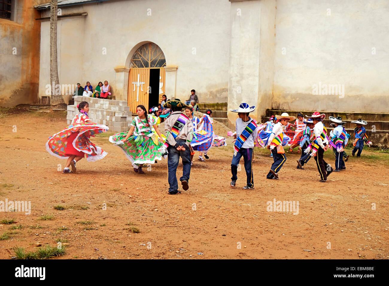 Young Zapotec Indian dancers at a Fiesta in a remote Mexican village in the Sierra Del Sur mountains in Oaxaca Stock Photo