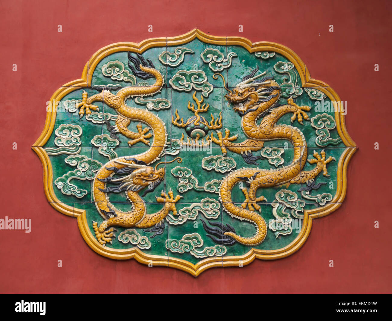 Close-up of a ornate glazed ceramic tiles with dragons at the concubine living quarters in the Forbidden City in Beijing, China Stock Photo