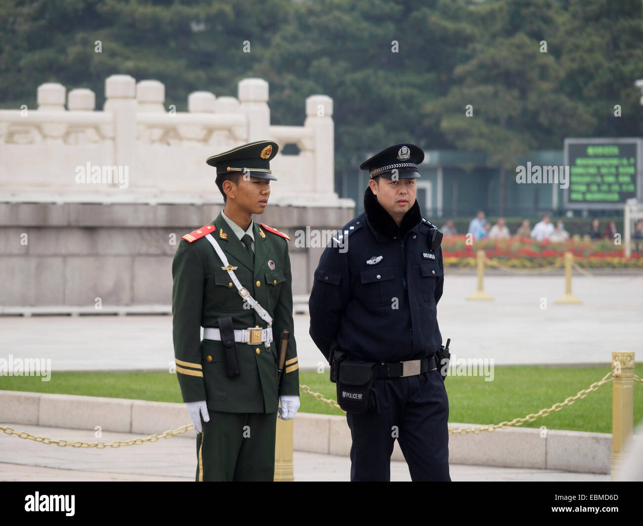 Chinese soldier and police officer in Tiananmen square, Beijing, China Stock Photo