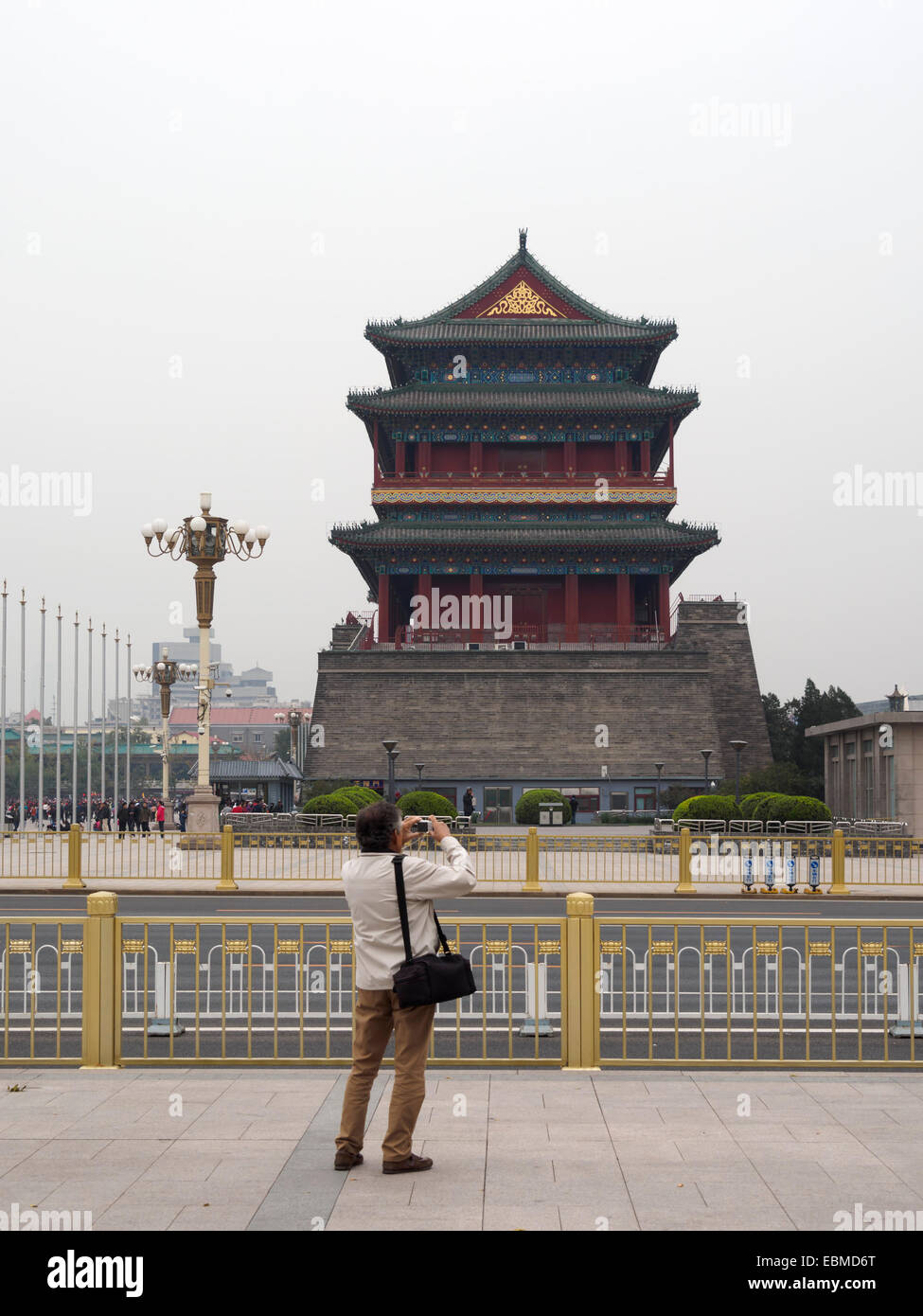 Tourist taking photos of the Zhengyang Men at the Tiananmen Square, Beijing, China Stock Photo