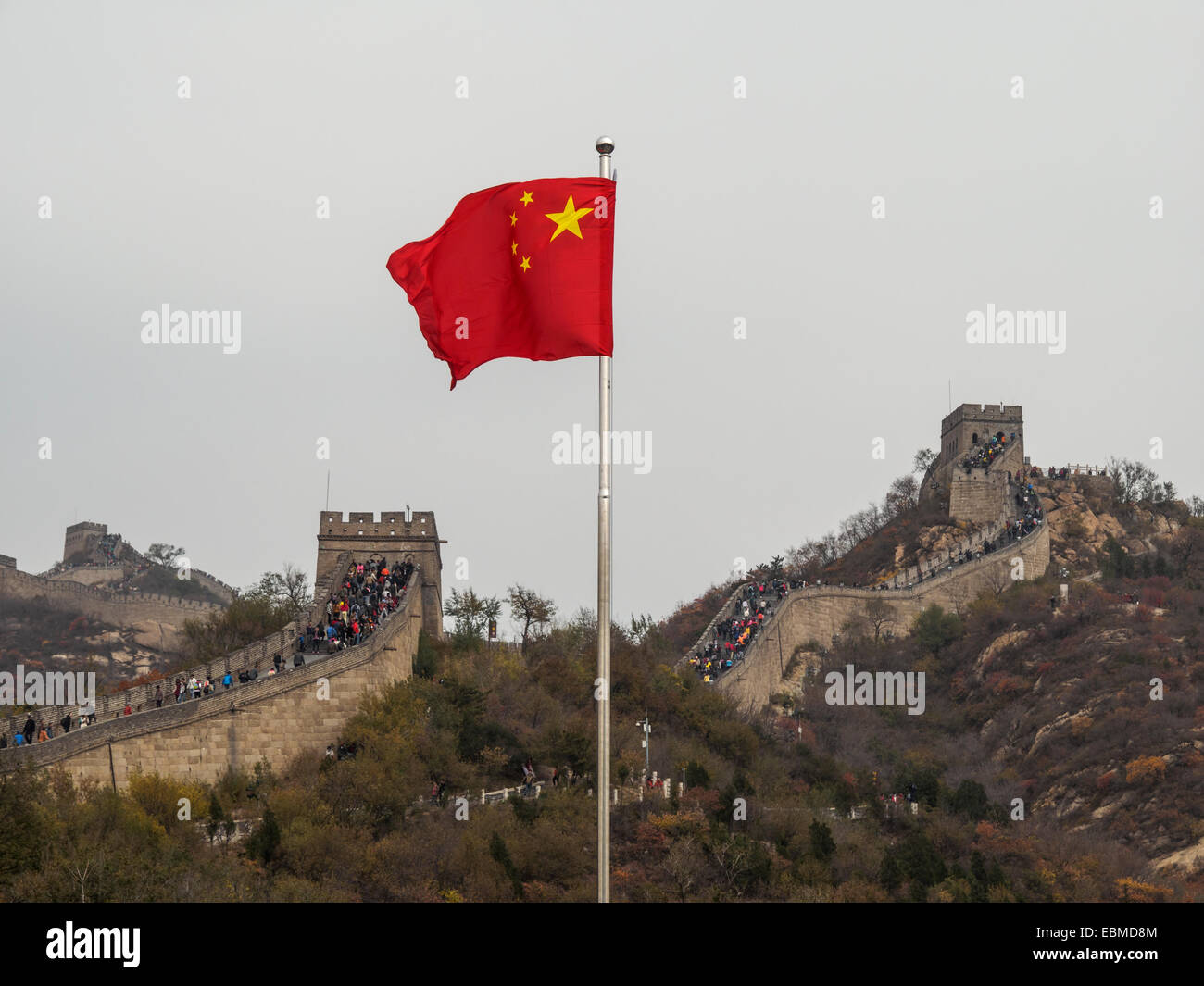 Chinese flag in front of The Great Wall of China Stock Photo