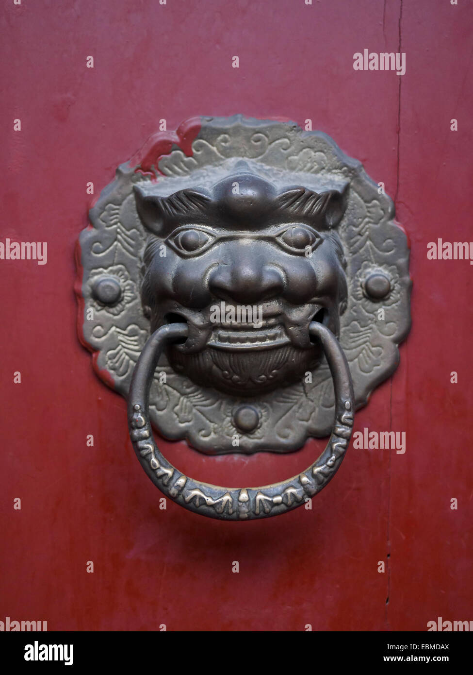 Metallic door knocker in China Stock Photo - Alamy