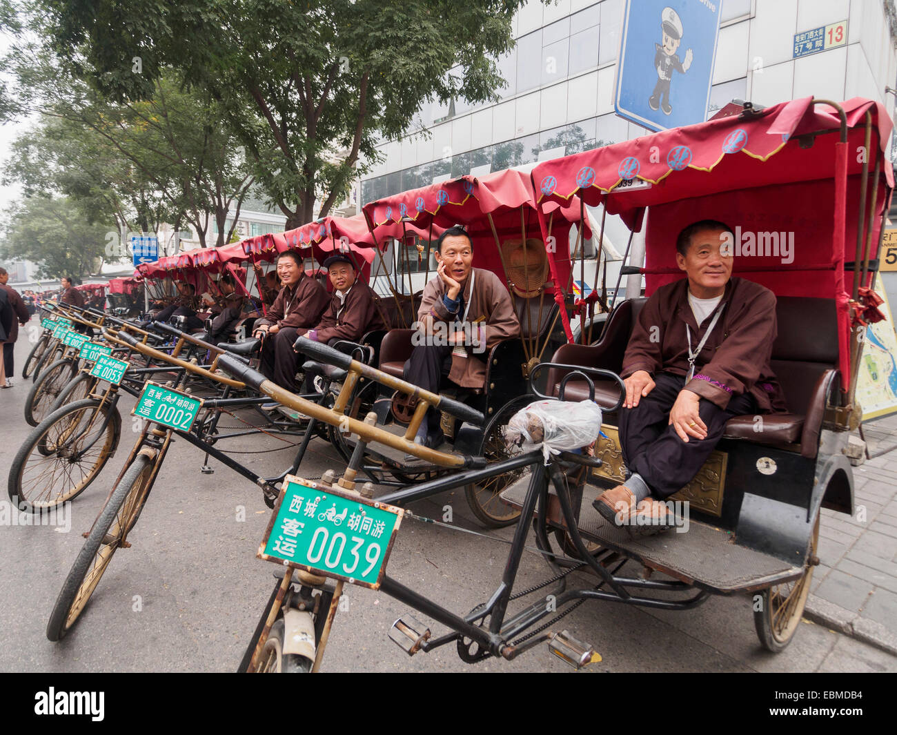 Rickshaws parked side by side on the streets of Beijing, China Stock Photo