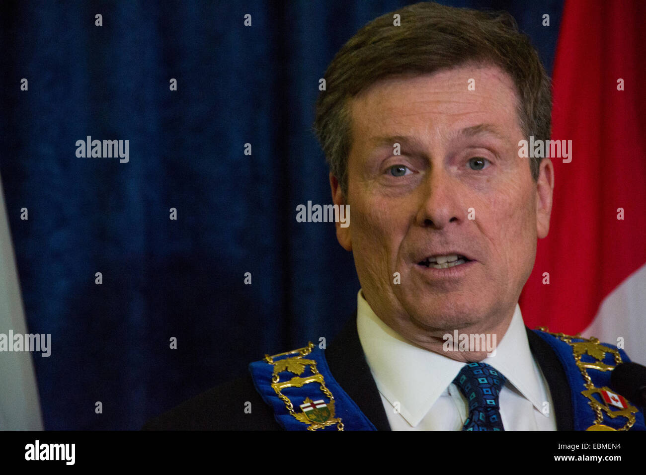 Toronto, Canada. 2nd December, 2014. Mayor John Tory is seen standing alongside former Ontario premier Bill Davis, speaking with reporters after the mayor's inaugural council meeting. Credit:  Nisarg Lakhmani/Alamy Live News Stock Photo