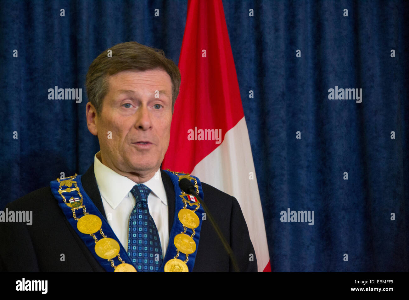 Toronto, Canada. 2nd December, 2014. Mayor John Tory is seen standing alongside former Ontario premier Bill Davis, speaking with reporters after the mayor's inaugural council meeting. Credit:  Nisarg Lakhmani/Alamy Live News Stock Photo
