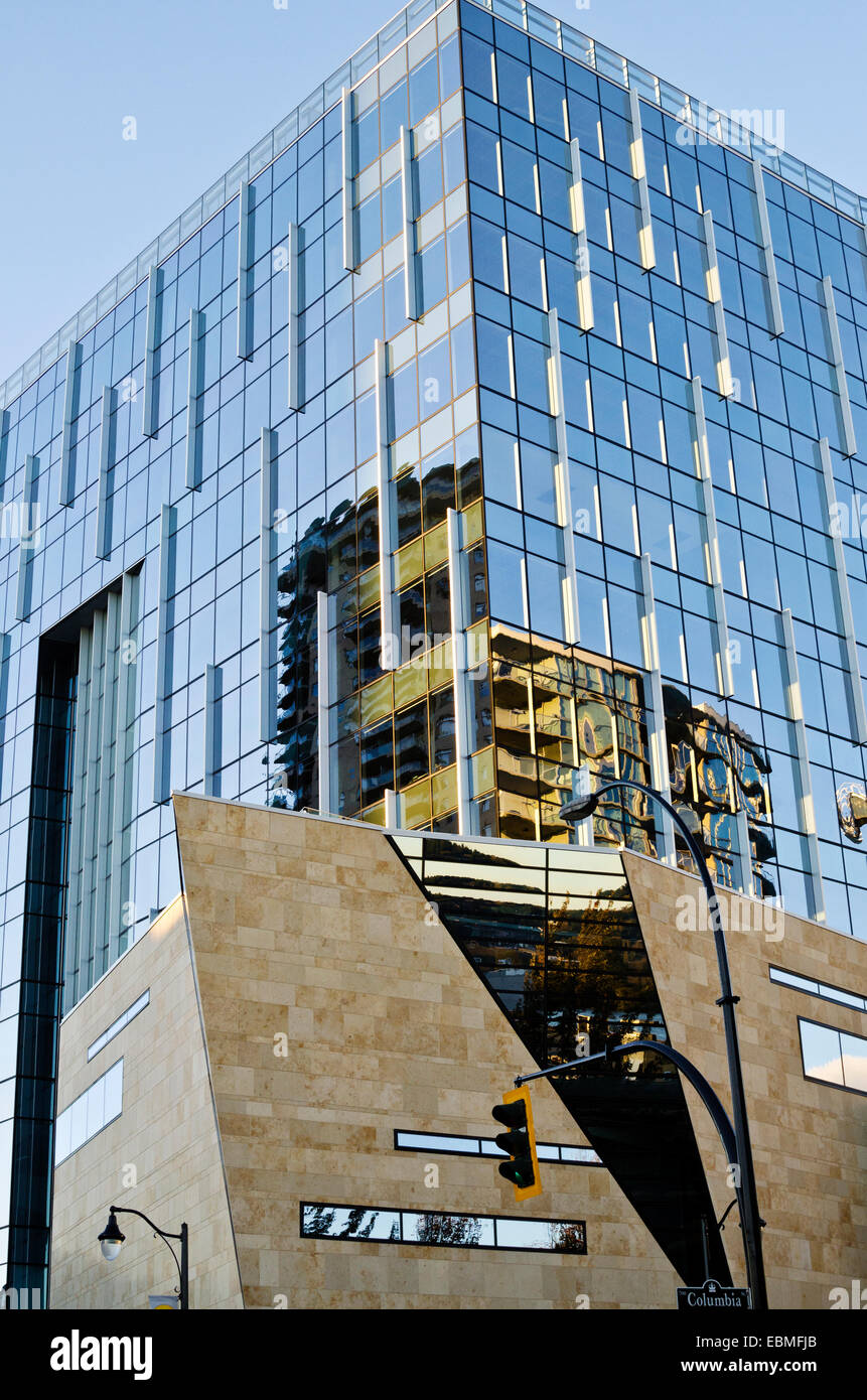 Anvil Centre, a new civic building in downtown New Westminster, BC, Canada.  Modern building architecture and reflections. Stock Photo
