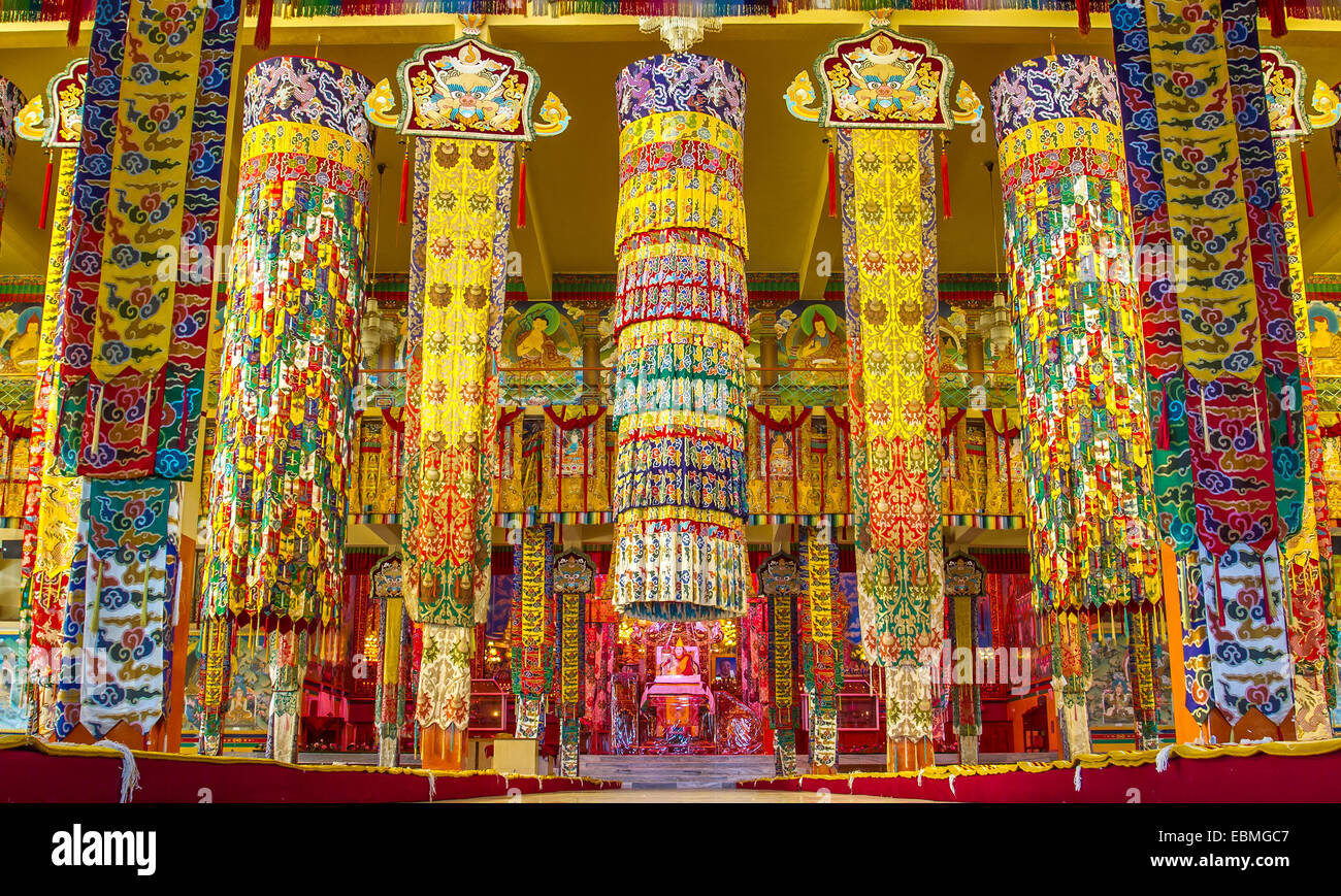 Brightly decorated Buddhist temple in Namdroling Monastery in Bylakuppe, Karnataka, India Stock Photo