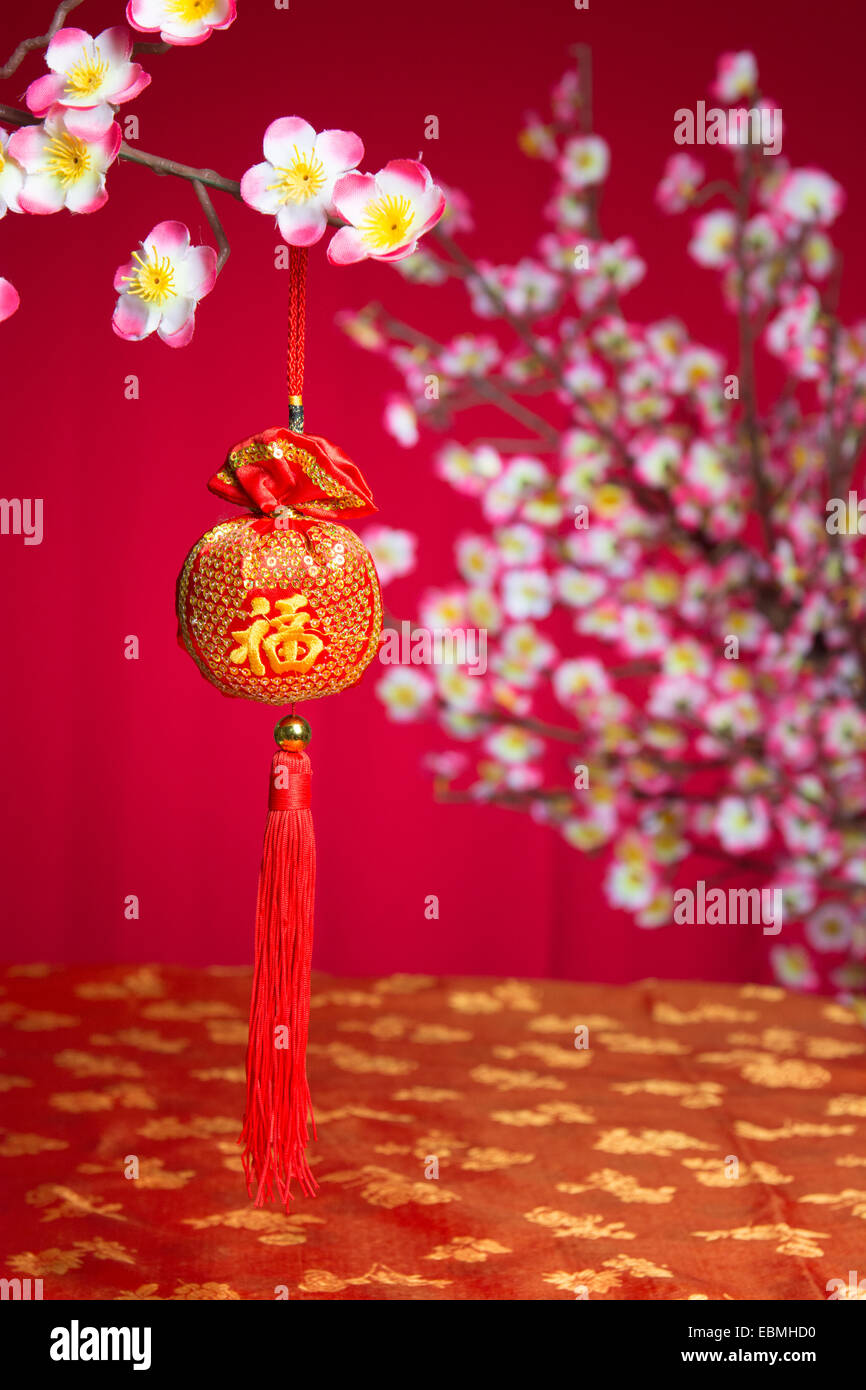 Chinese New Year Decorations On Cherry Blossom Tree Stock Photo