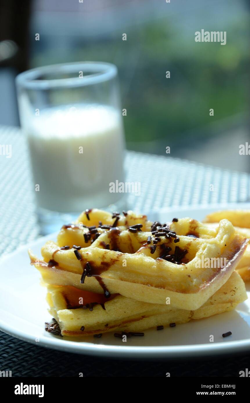 breakfast waffle with milk Stock Photo Alamy