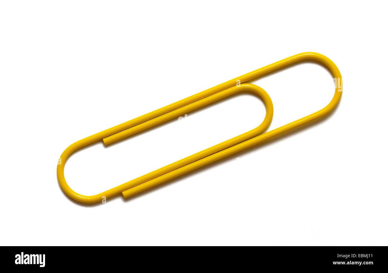 Giant paper clip arranged on a white paper background Stock Photo Alamy