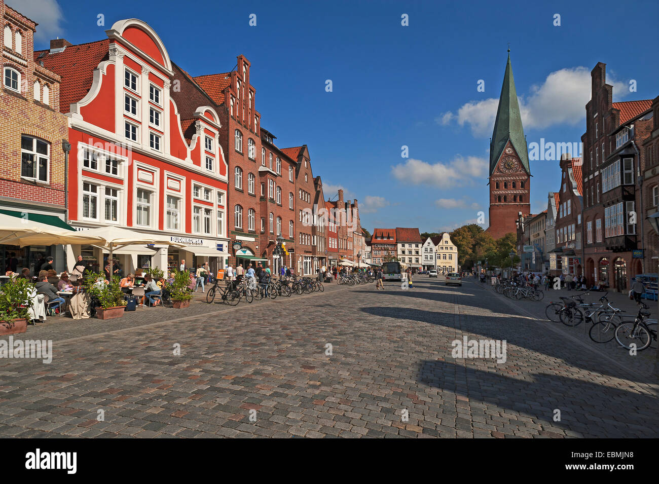 Old gabled houses from different eras, behind the St. John's Church, 1289-1470, brick Gothic, Am Sande, Lüneburg, Lower Saxony Stock Photo