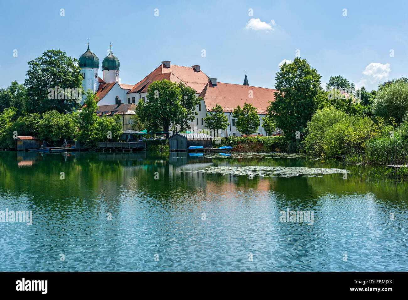 Benedictine monastery Seeon with monastery church of St. Lambert, Klostersee, Seebruck, Chiemgau, Upper Bavaria, Bavaria Stock Photo