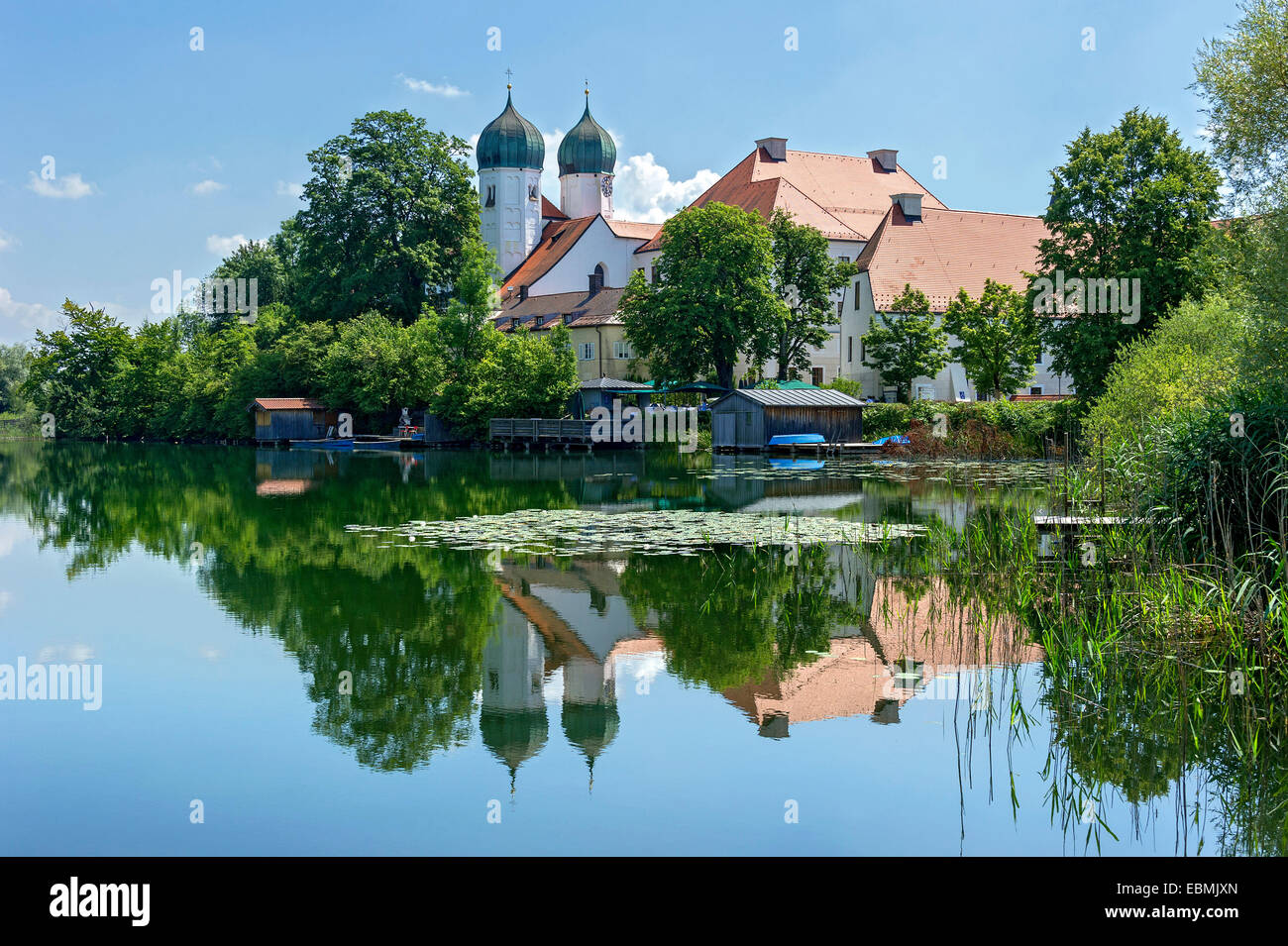 Benedictine monastery Seeon with monastery church of St. Lambert, Klostersee, Seebruck, Chiemgau, Upper Bavaria, Bavaria Stock Photo