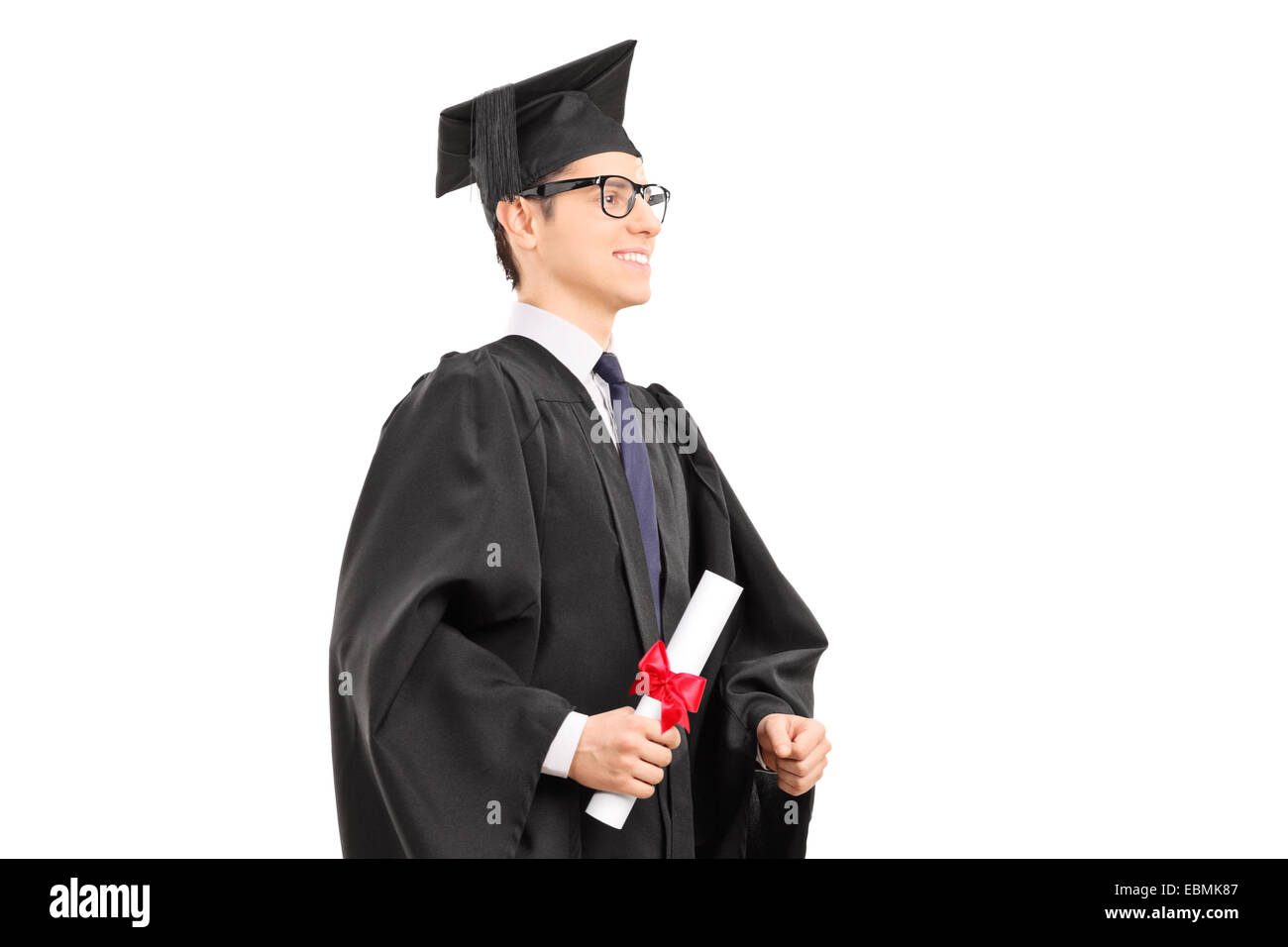 Graduate student with diploma in his hand isolated on white background ...