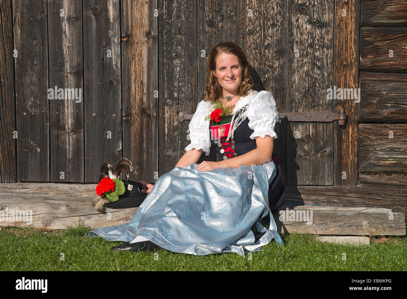 Young woman in traditional costume, Tyrolean traditional costume typical for the region Achensee, Pertisau am Achensee, Tyrol Stock Photo