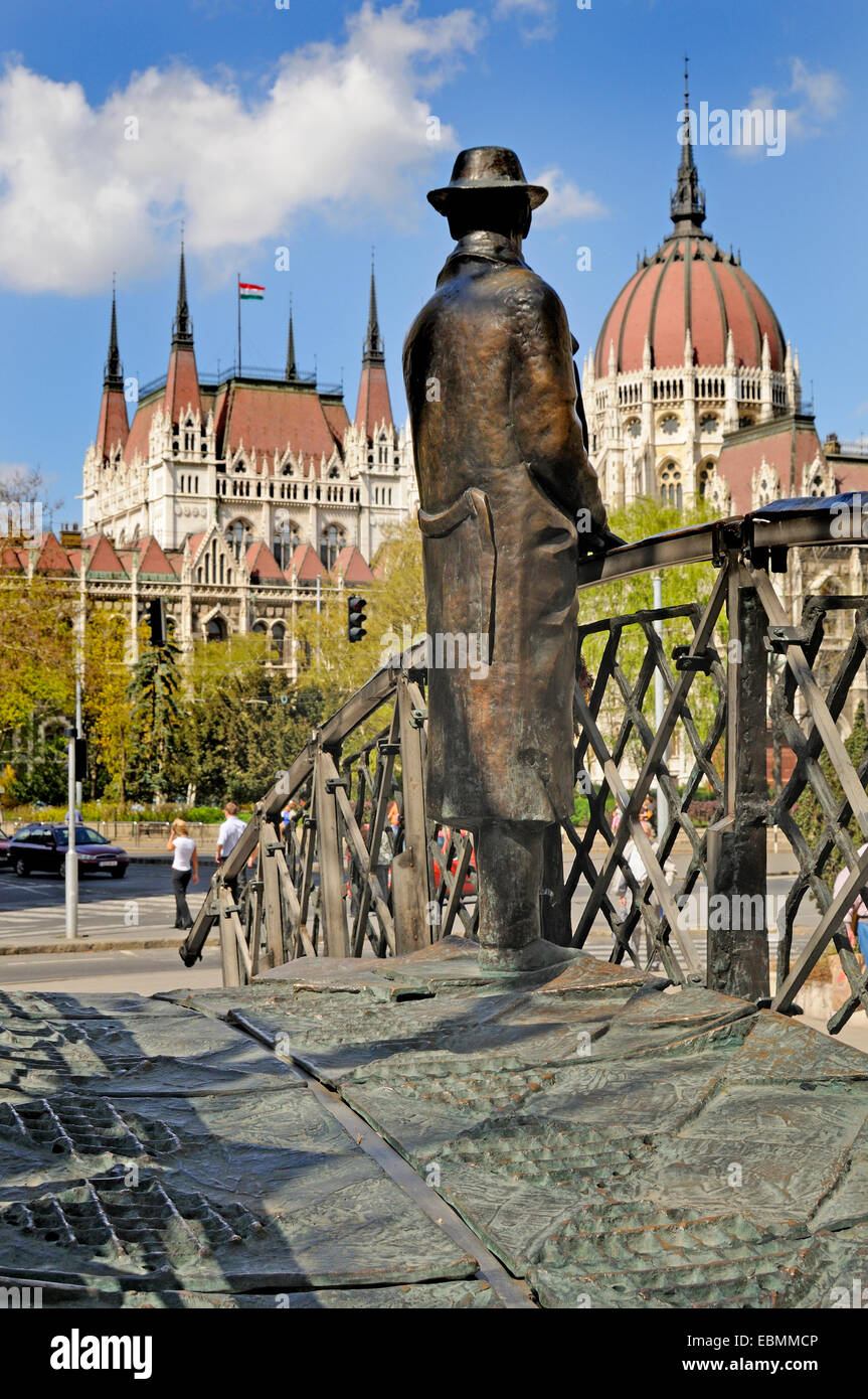 Budapest, Hungary. Parliament Building or Orszaghaz (Imre Steindl: 1884-1904) Statue of Imre Nagy on a bridge Stock Photo