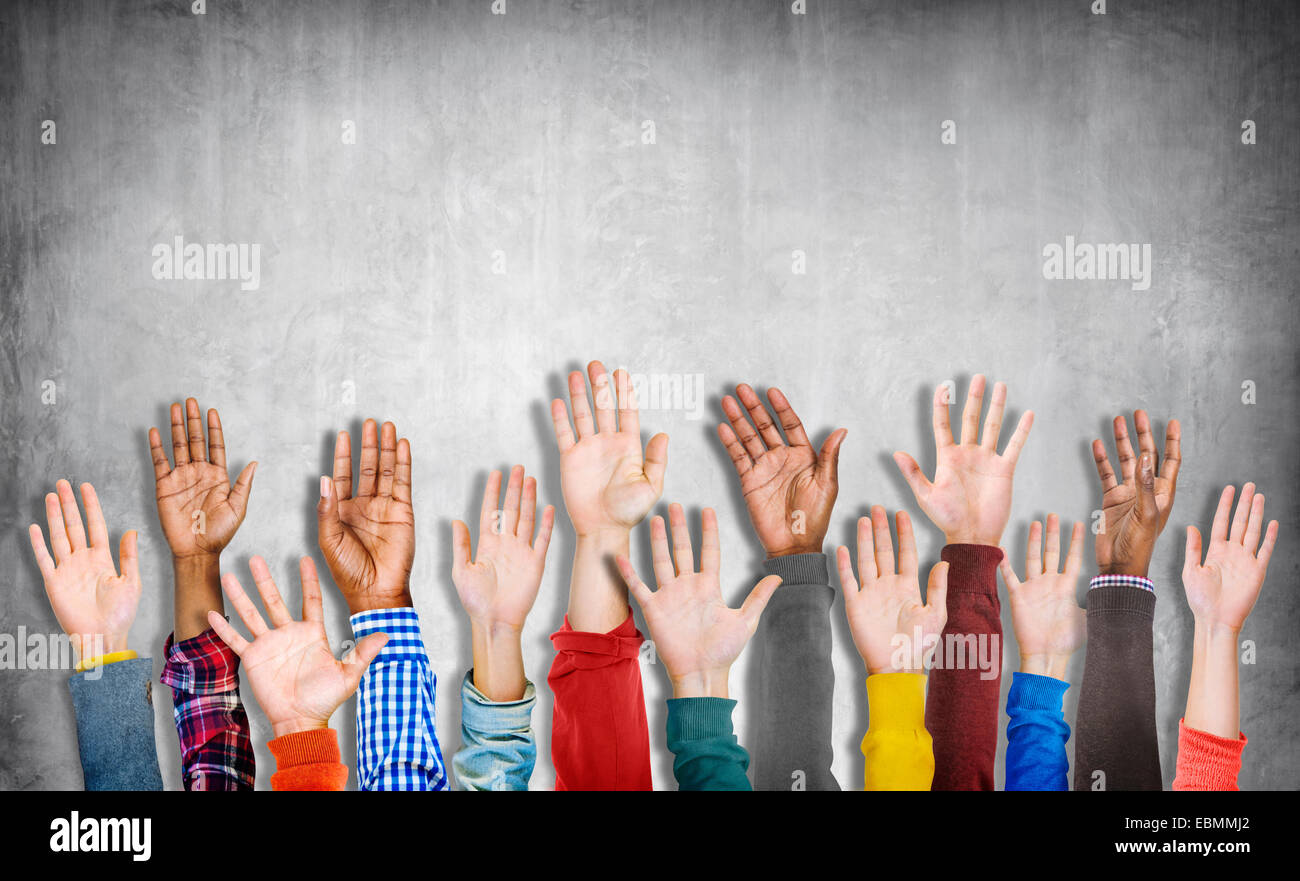 Diverse Group of Hands Raised Stock Photo - Alamy