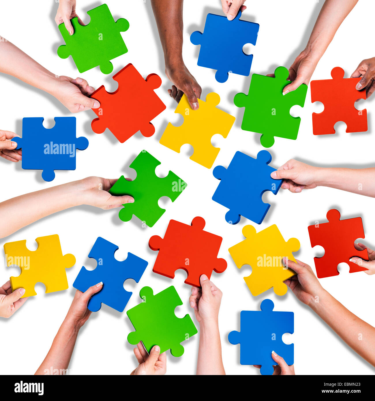 Group of Diverse Hands Holding Jigsaw Puzzle Stock Photo Alamy