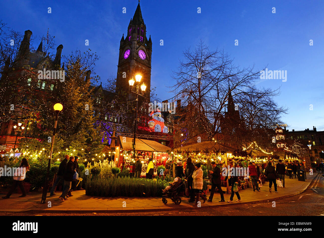 Christmas Market in front of The Town Hall, in Albert Square, Manchester, England. Stock Photo