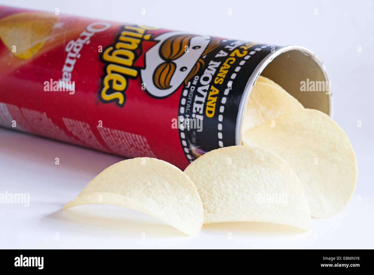open tub of Pringles Original with contents spilled on white background