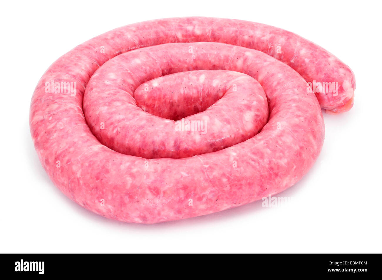 a rolled uncooked pork meat sausage on a white background Stock Photo